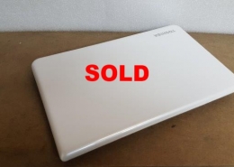 White Toshiba Laptop Sold